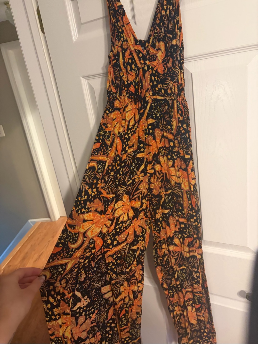 Angie Black and Orange Floral Wrap Jumpsuit